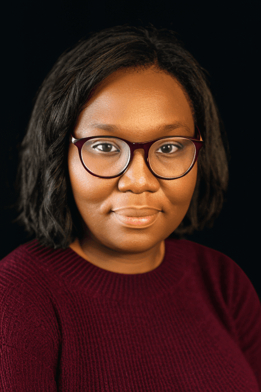 Professional headshot of Priscilla Kilili