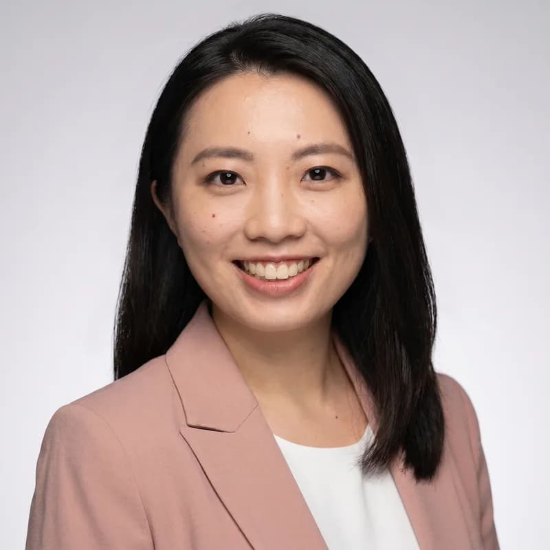 Professional headshot of Annie Margarita Yang