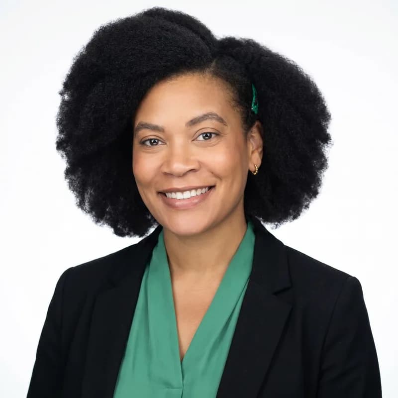 Professional headshot of Tiffany K