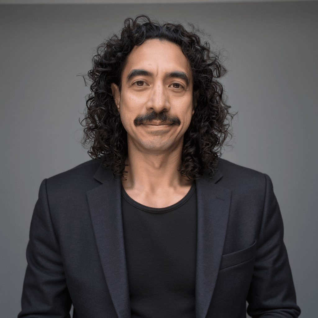 Professional headshot of Ryan Tronier